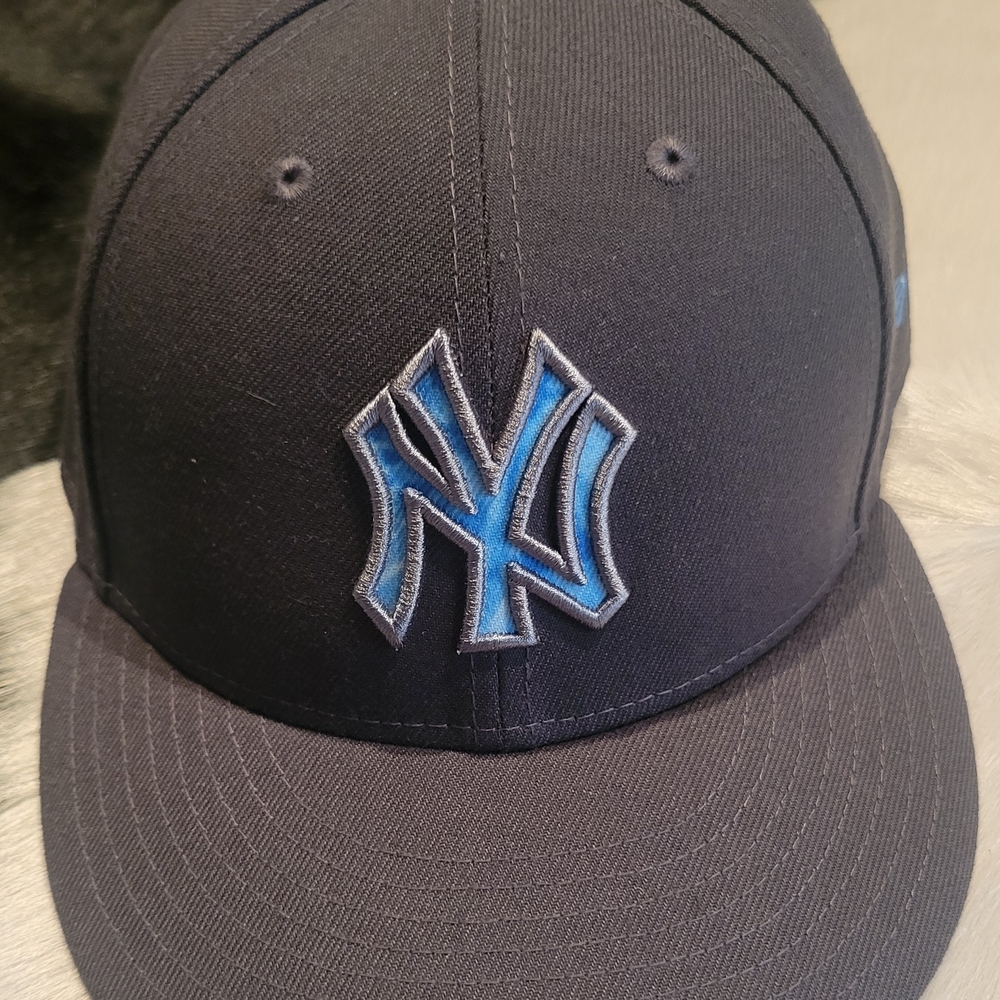 New Era Navy Blue Cap with Light Blue Logo